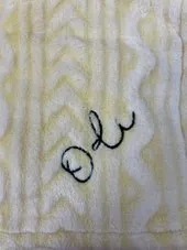 Embroidered name on beach towel