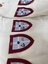 Embroidered logos on shirts